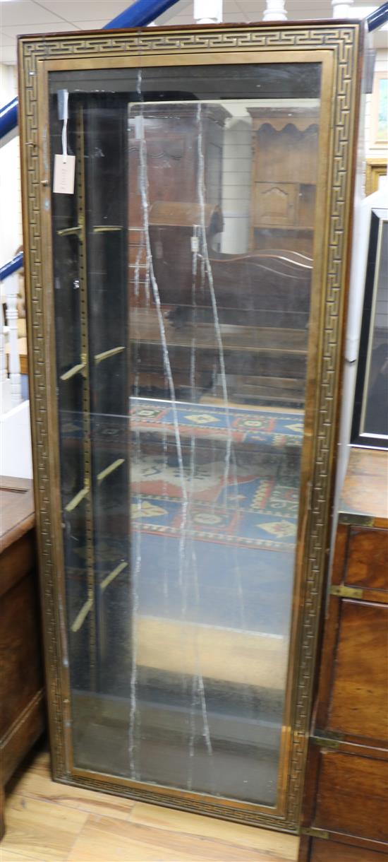 A brass mounted mirrored display cabinet W.64cm